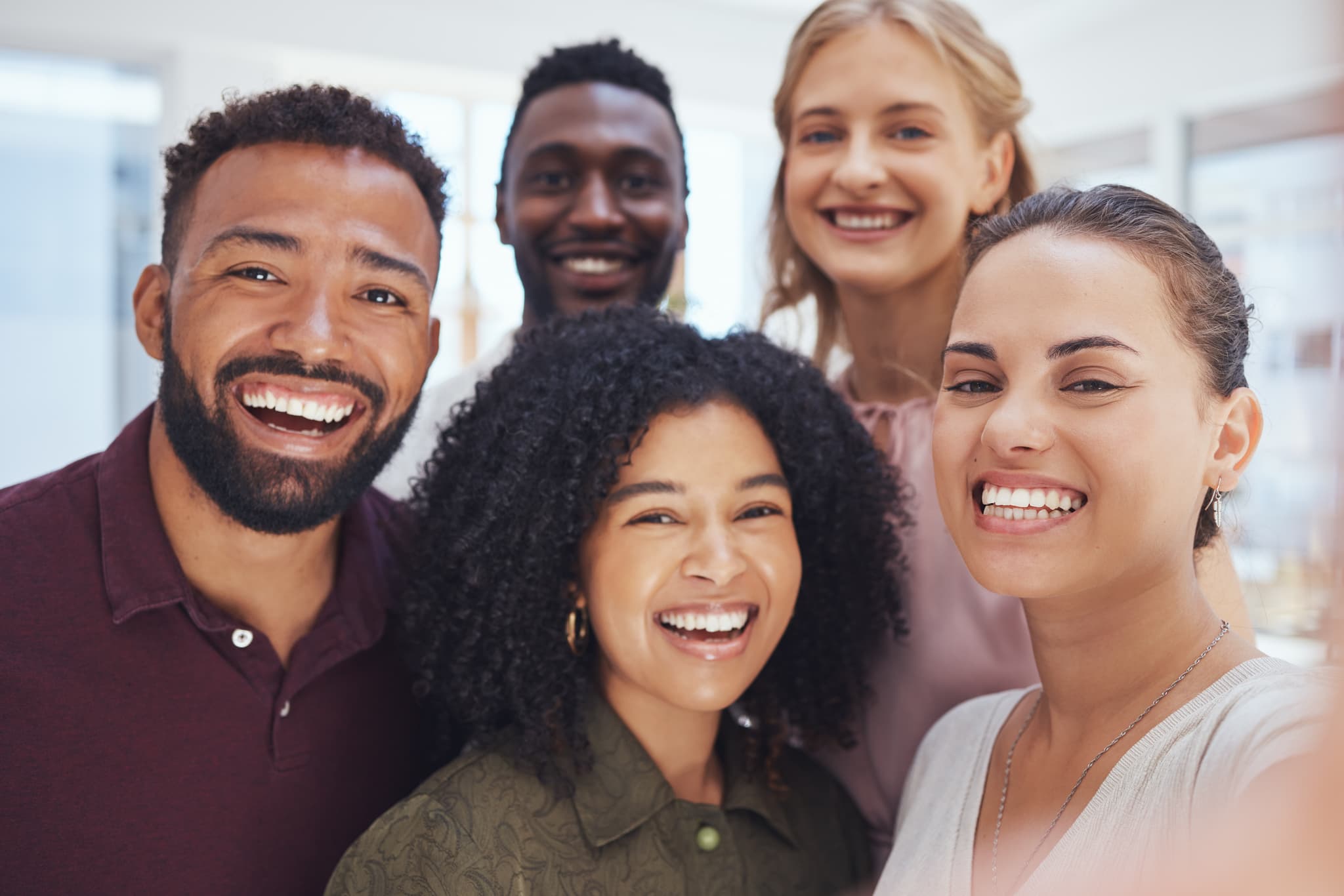 Diverse team of professionals smiling together